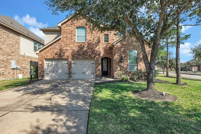 traditional-style house with driveway, brick siding, an attached garage, and a front lawn