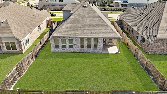 birds eye view of property with a residential view