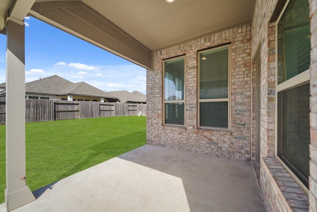 view of patio with fence