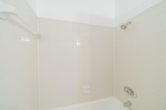 bathroom with shower / tub combination