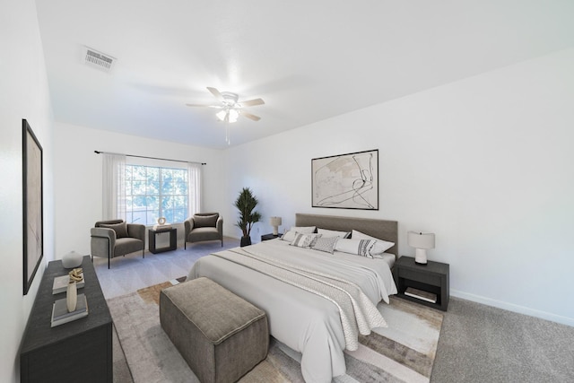 bedroom with baseboards, visible vents, ceiling fan, and carpet flooring