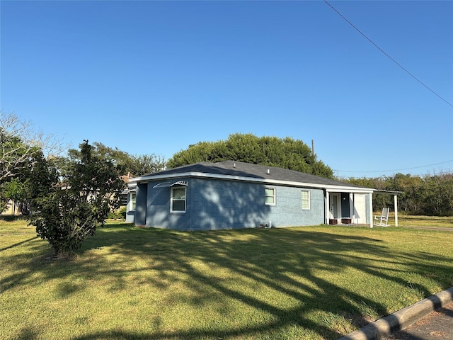 exterior space with a lawn