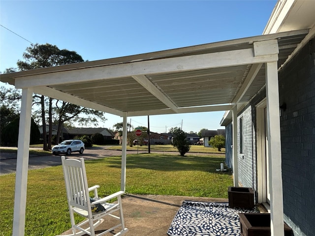 view of patio / terrace with a carport