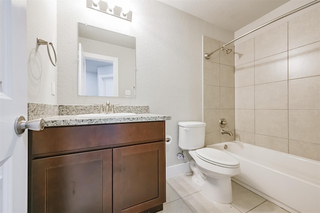 bathroom featuring bathing tub / shower combination, vanity, toilet, and tile patterned floors