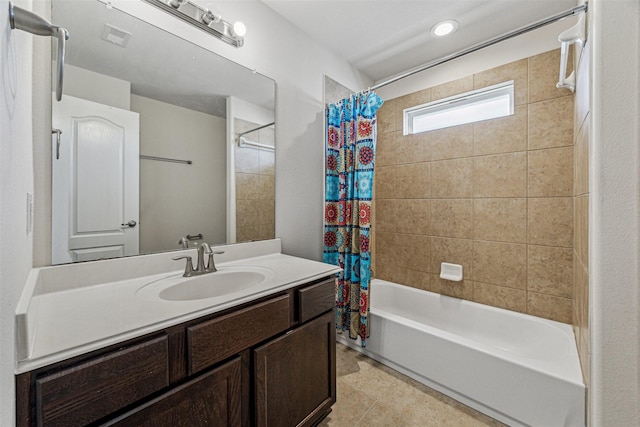 bathroom with tile patterned flooring, vanity, visible vents, and shower / bathtub combination with curtain