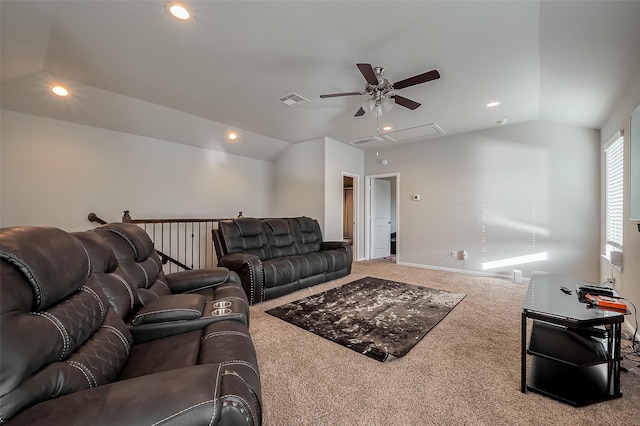 carpeted living room with attic access, lofted ceiling, visible vents, and recessed lighting