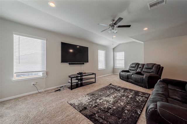 carpeted living room with baseboards, visible vents, a ceiling fan, vaulted ceiling, and recessed lighting