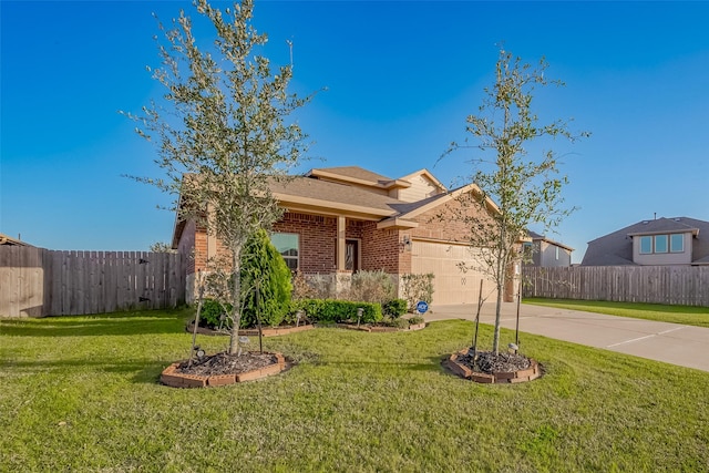 ranch-style home with a front yard, brick siding, fence, and an attached garage