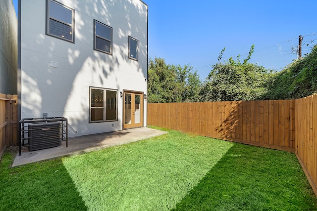 view of yard with a patio area and a fenced backyard