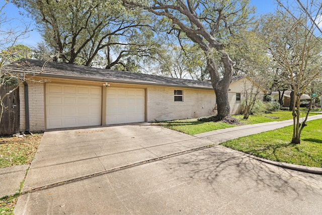 exterior space featuring concrete driveway