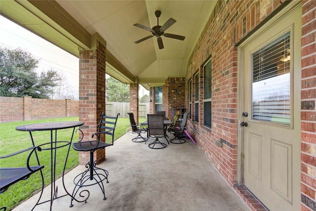 view of patio / terrace with ceiling fan, outdoor dining area, and a fenced backyard