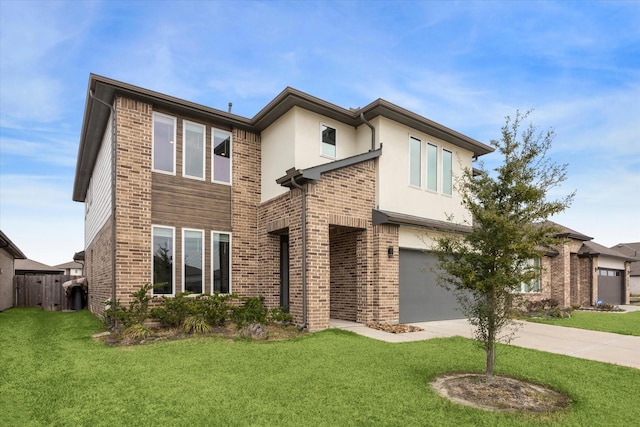 view of front facade with a garage, brick siding, fence, driveway, and a front yard