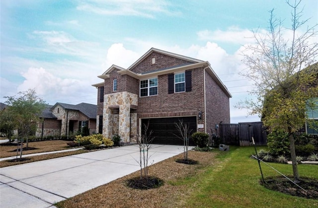 traditional home with an attached garage, brick siding, stone siding, driveway, and a front yard