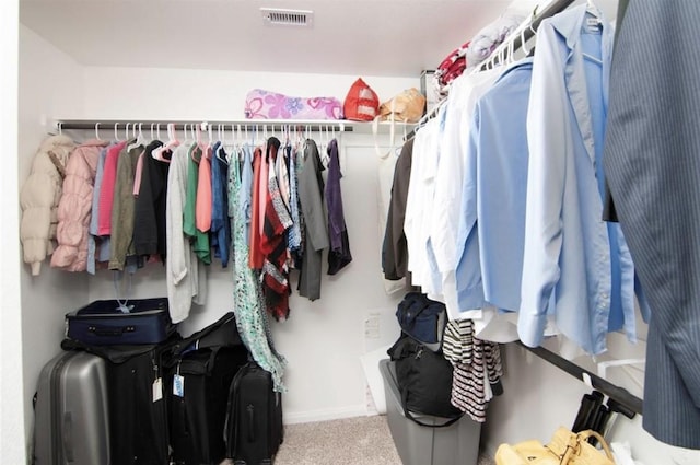 spacious closet with carpet and visible vents