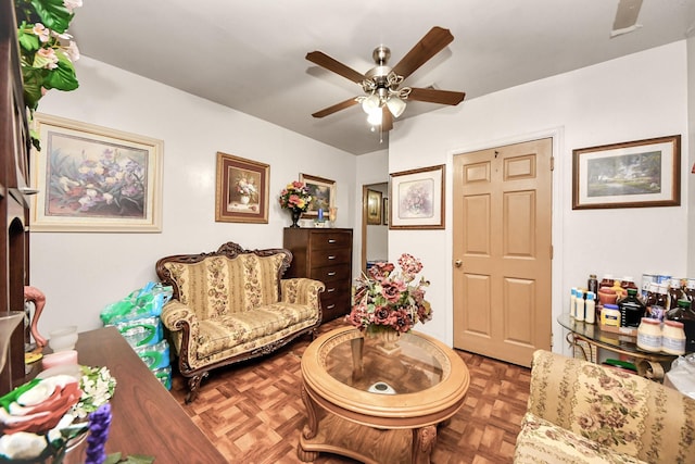 living room featuring a ceiling fan