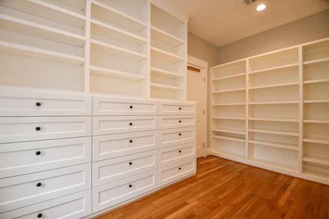 walk in closet featuring visible vents and light wood-style flooring