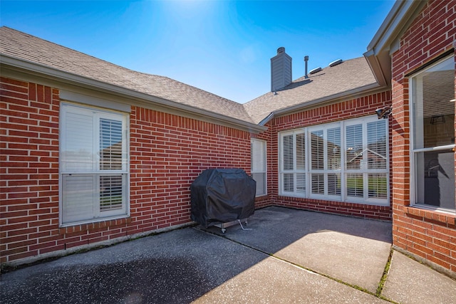 view of patio with a grill