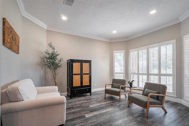 living area with recessed lighting, dark wood-style flooring, visible vents, baseboards, and crown molding