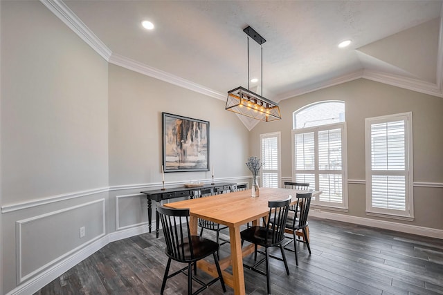 dining area featuring dark wood-style flooring, recessed lighting, ornamental molding, wainscoting, and vaulted ceiling