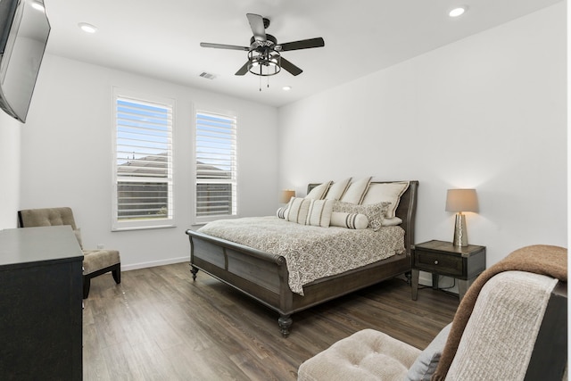 bedroom with recessed lighting, wood finished floors, and visible vents