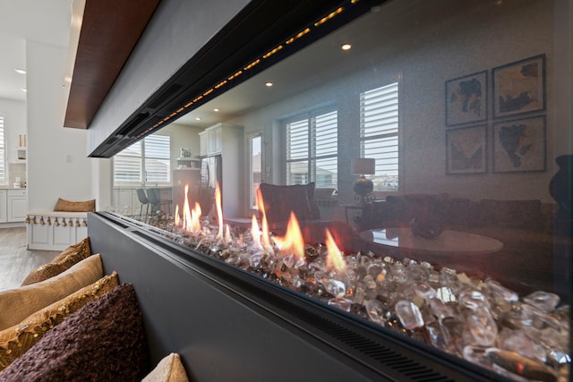 interior details featuring recessed lighting and a fire pit