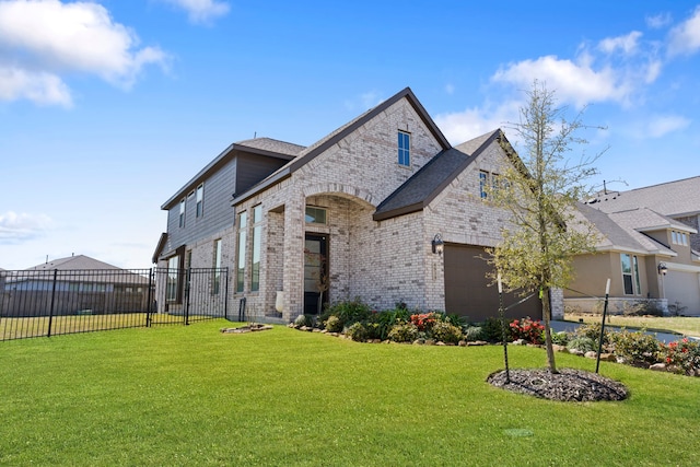 view of front of property featuring a garage, brick siding, a front lawn, and fence