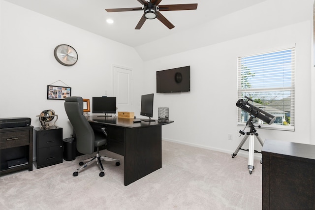 office space featuring a ceiling fan, baseboards, recessed lighting, vaulted ceiling, and light colored carpet