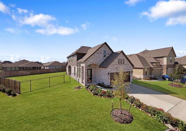 view of side of property featuring fence, a yard, concrete driveway, a garage, and brick siding