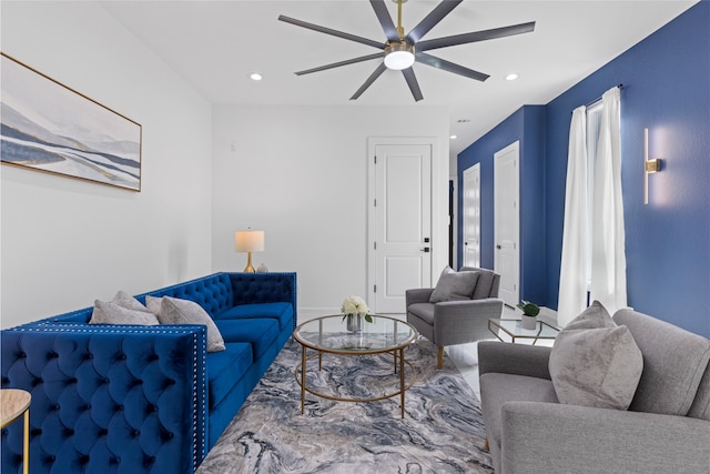 living room with ceiling fan, baseboards, and recessed lighting