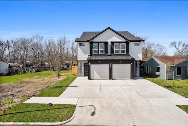 view of front of home featuring a front yard, driveway, stairway, and an attached garage