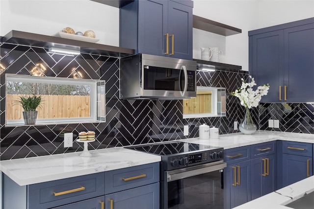 kitchen featuring electric stove, stainless steel microwave, open shelves, and blue cabinets