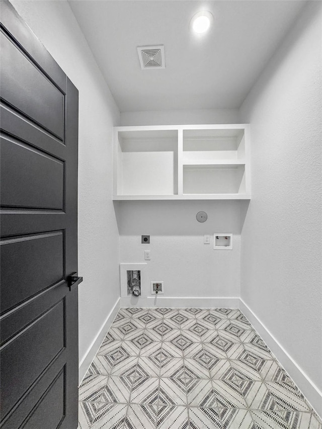 washroom featuring laundry area, visible vents, hookup for a gas dryer, hookup for a washing machine, and electric dryer hookup