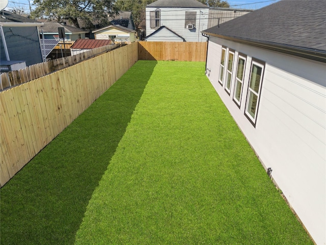 view of yard featuring a fenced backyard