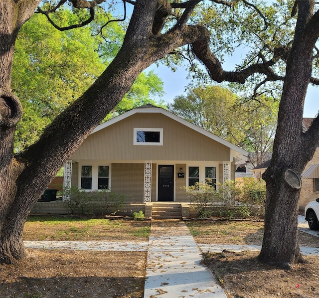 bungalow with brick siding