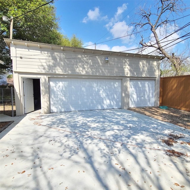 detached garage with fence