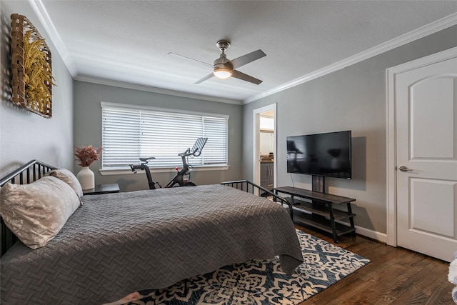 bedroom with baseboards, ceiling fan, wood finished floors, and crown molding