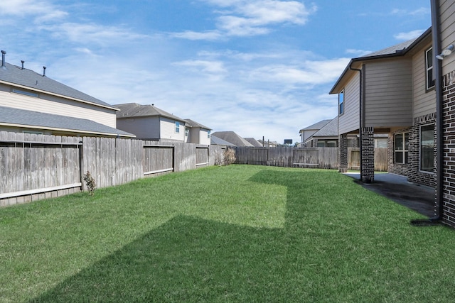 view of yard featuring a fenced backyard