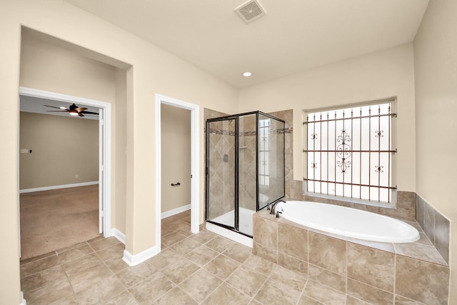 bathroom featuring a garden tub, tile patterned flooring, a shower stall, and visible vents