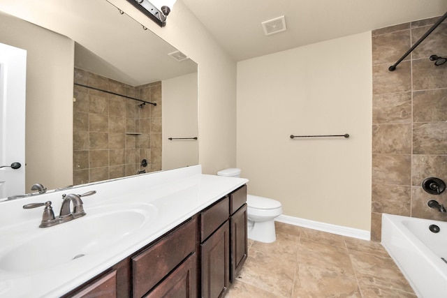 bathroom featuring visible vents, toilet, vanity, shower / tub combination, and baseboards