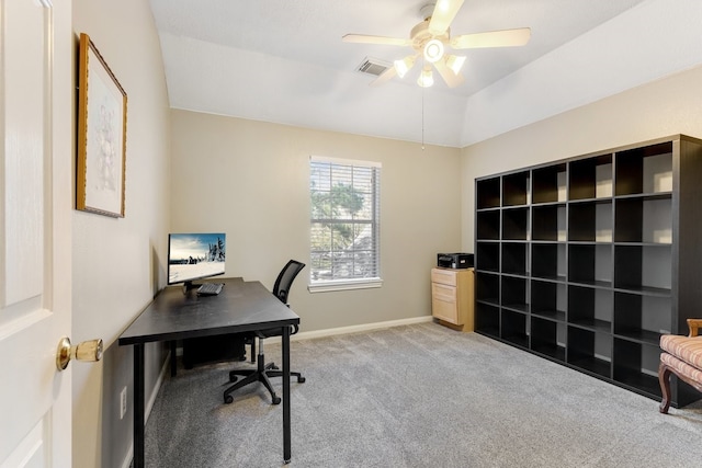 office area with a ceiling fan, carpet, visible vents, baseboards, and vaulted ceiling