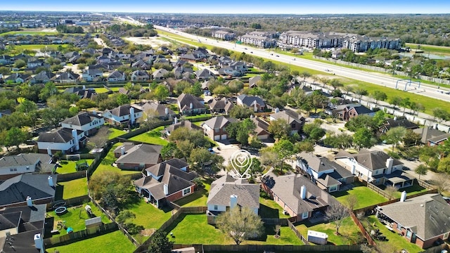 drone / aerial view with a residential view