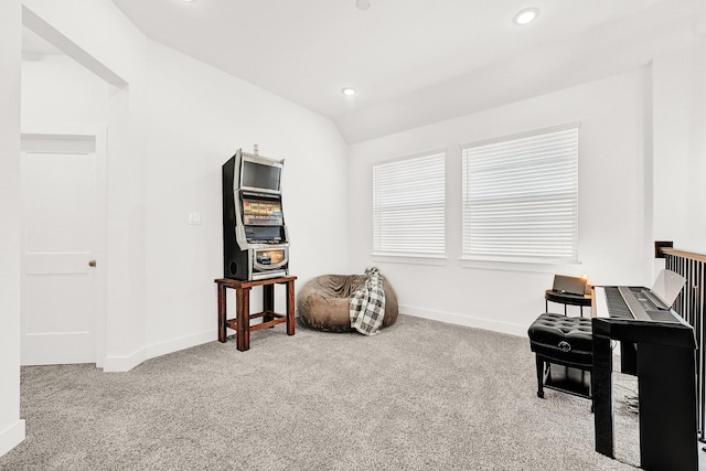 living area featuring lofted ceiling, carpet, baseboards, and recessed lighting