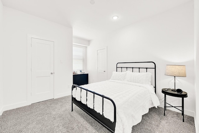 bedroom with carpet, baseboards, and recessed lighting