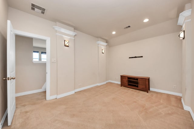 interior space with light carpet, baseboards, visible vents, and recessed lighting