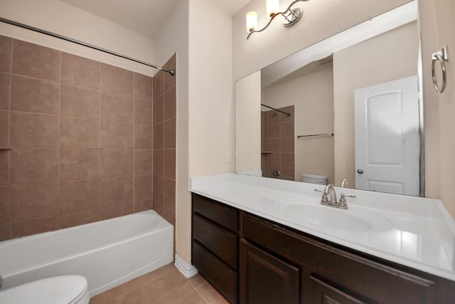 full bathroom featuring vanity, shower / bathing tub combination, tile patterned flooring, and toilet