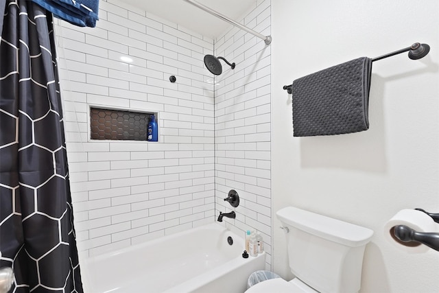 bathroom with toilet and shower / tub combo with curtain