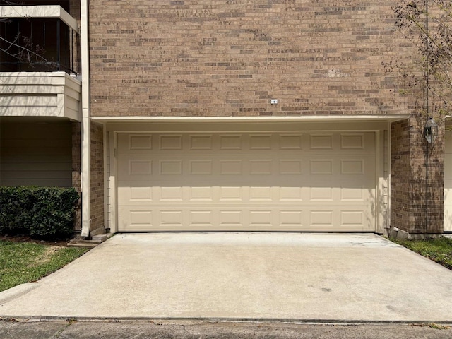 garage featuring driveway