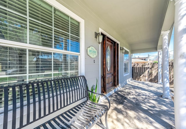 property entrance featuring covered porch