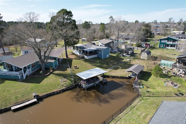 aerial view with a water view and a residential view