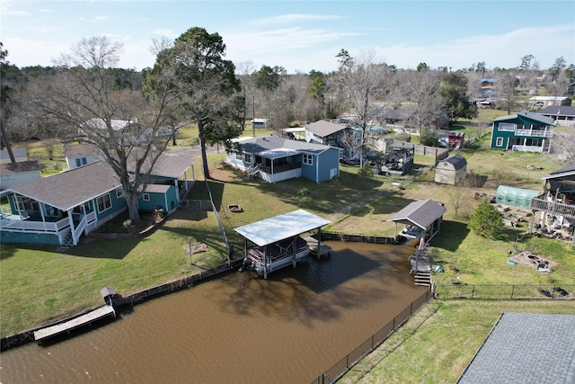 aerial view featuring a water view and a residential view